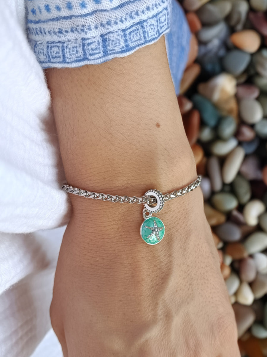 Charm estrella verde mar