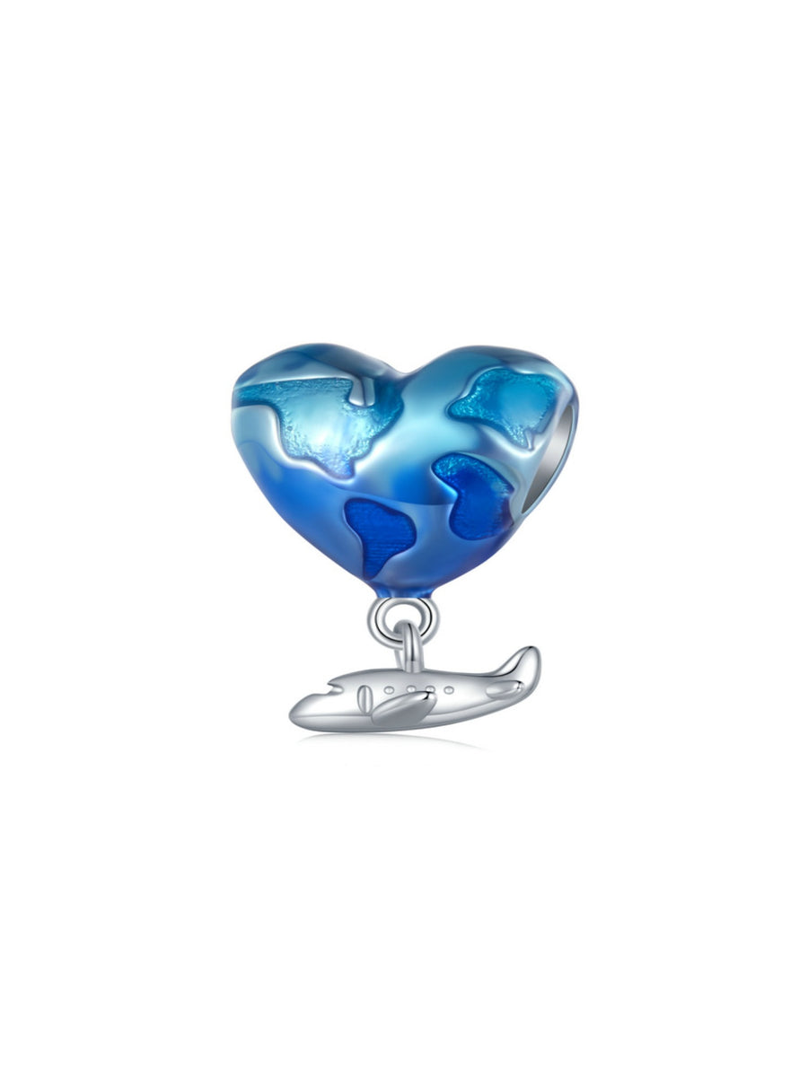 Charm corazón viajero